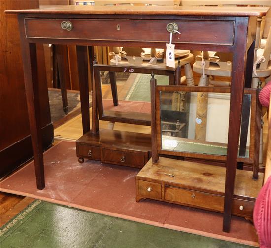 A George III mahogany side table and two toilet mirrors Table W.86cm, Largest mirror 48cm